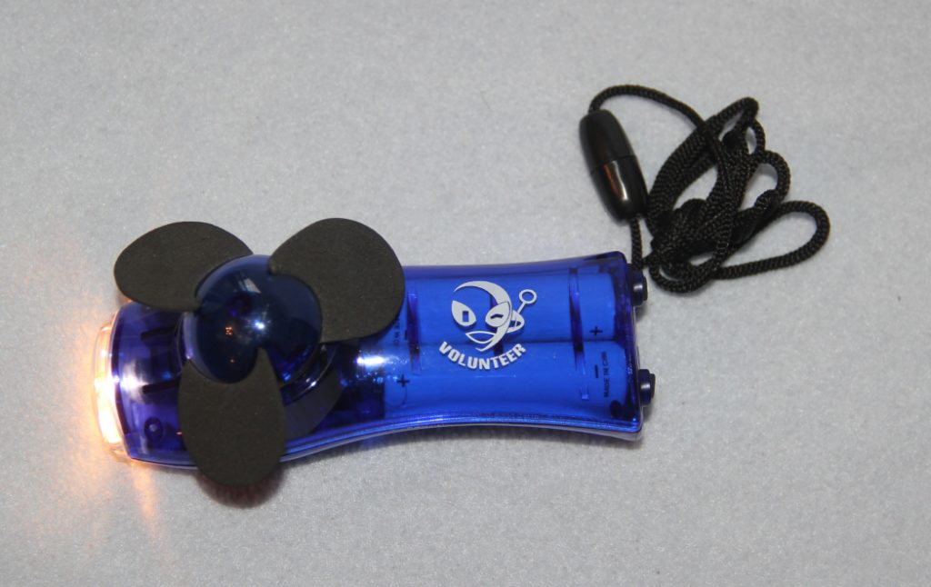 purple mini-fan and flashlight combo